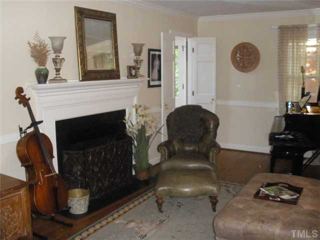 2633 Lakeview Drive Raleigh, NC 27608 - Photo 2 of 18 Formal living room with fireplace.