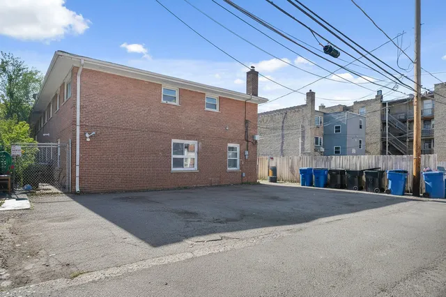 a view of a building with a street