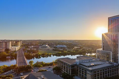 a view of a city with tall buildings