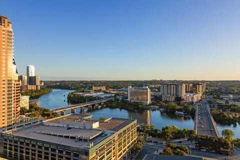 a view of a patio with a table and chairs