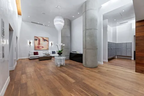 a room with furniture and a flat screen tv