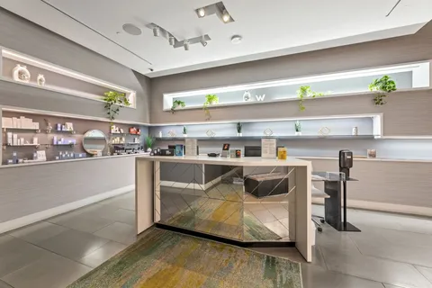 a view of small yard and front of retail shop