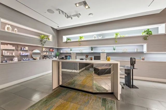 a view of small yard and front of retail shop