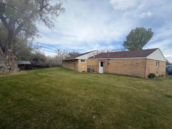 $429,500 | 809 Bighorn Avenue West, Basin, WY 82410