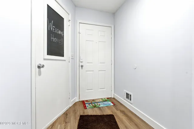 a view of bathroom with bathtub and shower