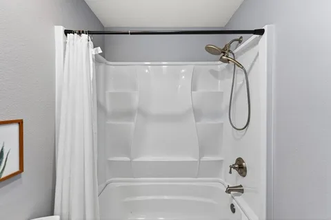 a bathroom that has a shower in it