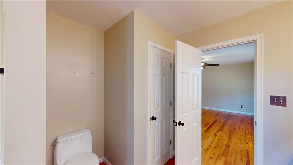 1042 Mission Road Southwest Cartersville, GA 30120 - Photo 21 of 40 a bathroom with a shower and a toilet