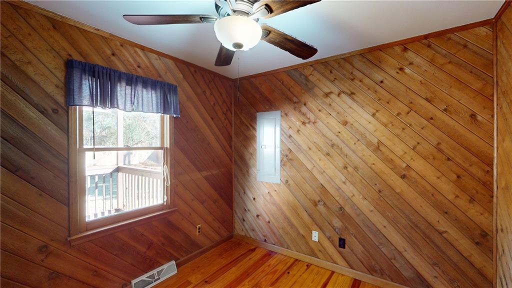 1042 Mission Road Southwest Cartersville, GA 30120 - Photo 32 of 40 a view of an empty room with a window