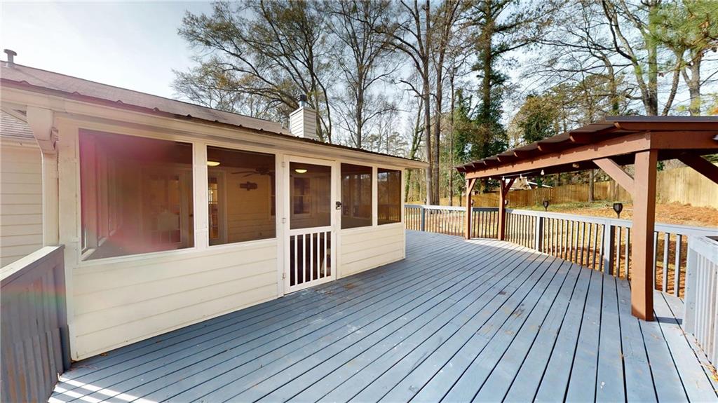 1042 Mission Road Southwest Cartersville, GA 30120 - Photo 35 of 40 a view of a house with wooden deck
