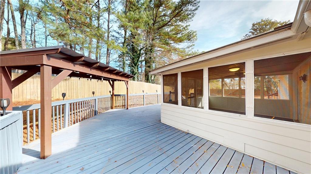 1042 Mission Road Southwest Cartersville, GA 30120 - Photo 37 of 40 a view of a house with a deck