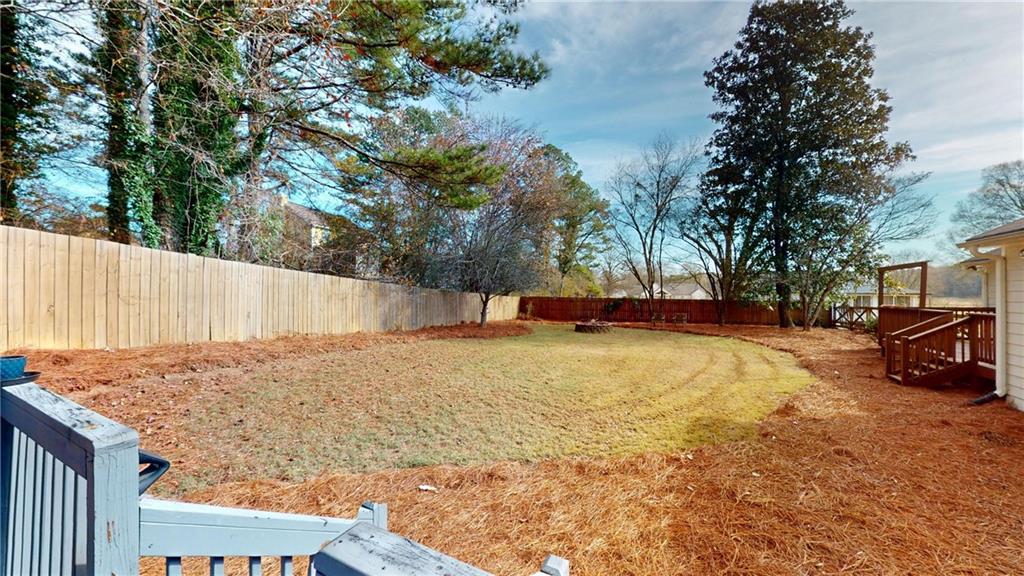 1042 Mission Road Southwest Cartersville, GA 30120 - Photo 38 of 40 a view of yard with swimming pool and trees