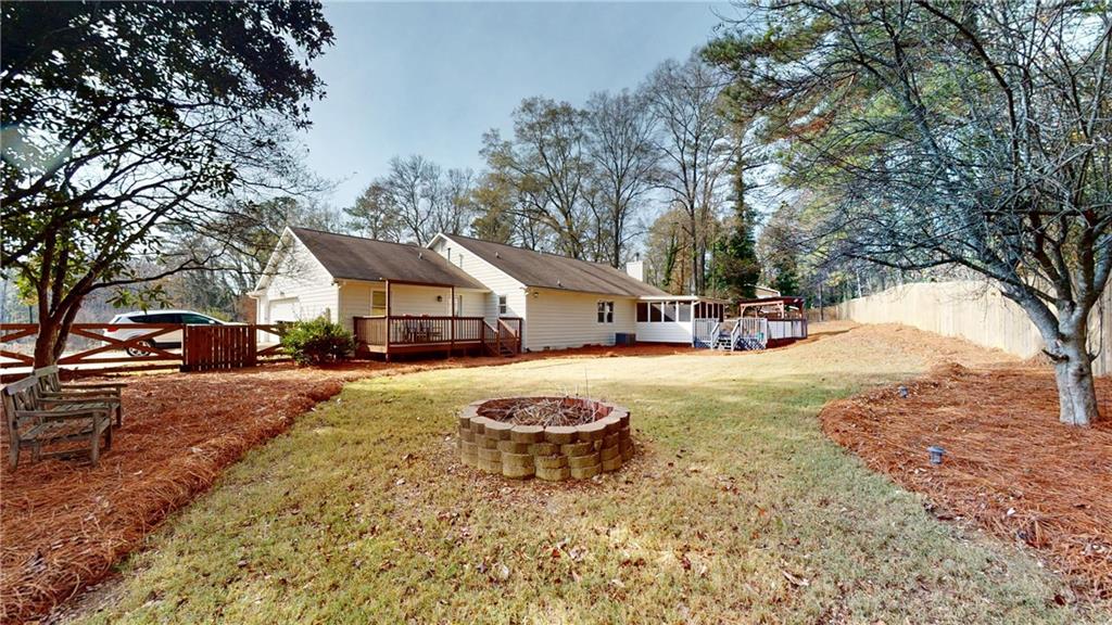 1042 Mission Road Southwest Cartersville, GA 30120 - Photo 39 of 40 a street view with a car parked in front of it