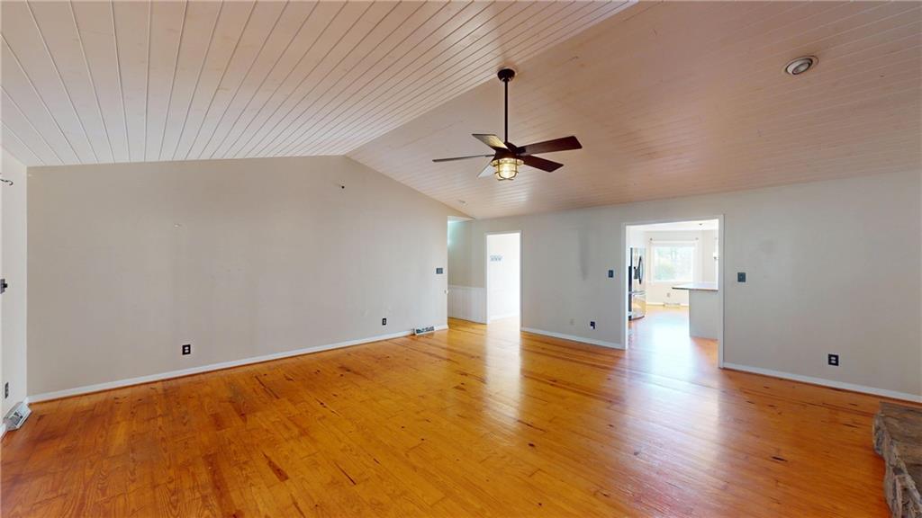 1042 Mission Road Southwest Cartersville, GA 30120 - Photo 8 of 40 a view of empty room with wooden floor