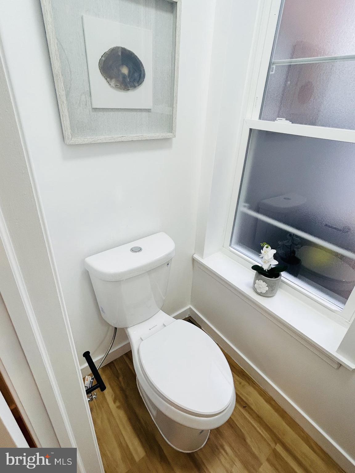 2013 South Bouvier Street Philadelphia, PA 19145 - Photo 13 of 18 a bathroom with a toilet and a sink