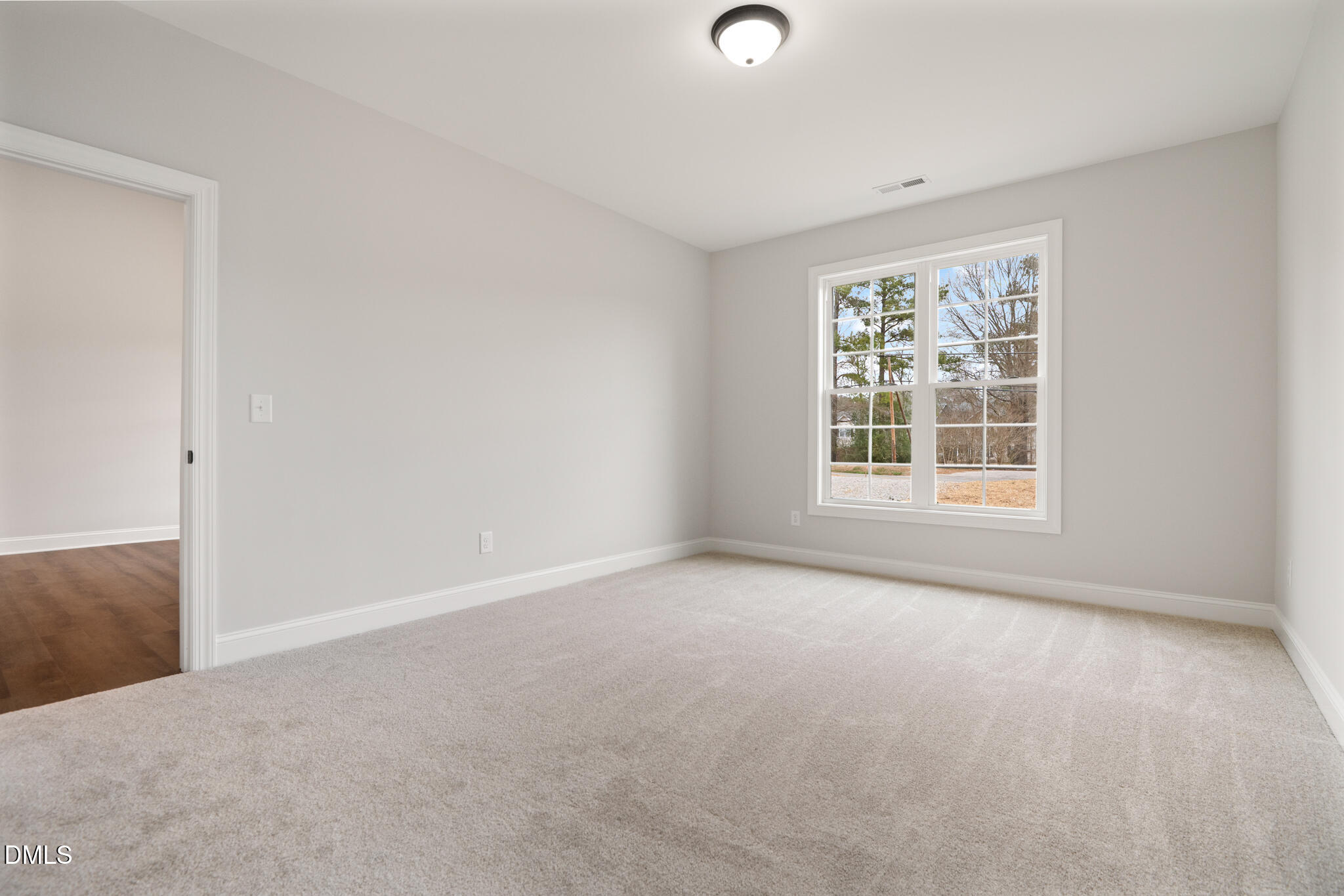 374 Vicksboro Road Henderson, NC 27536 - Photo 13 of 23 an empty room with a window