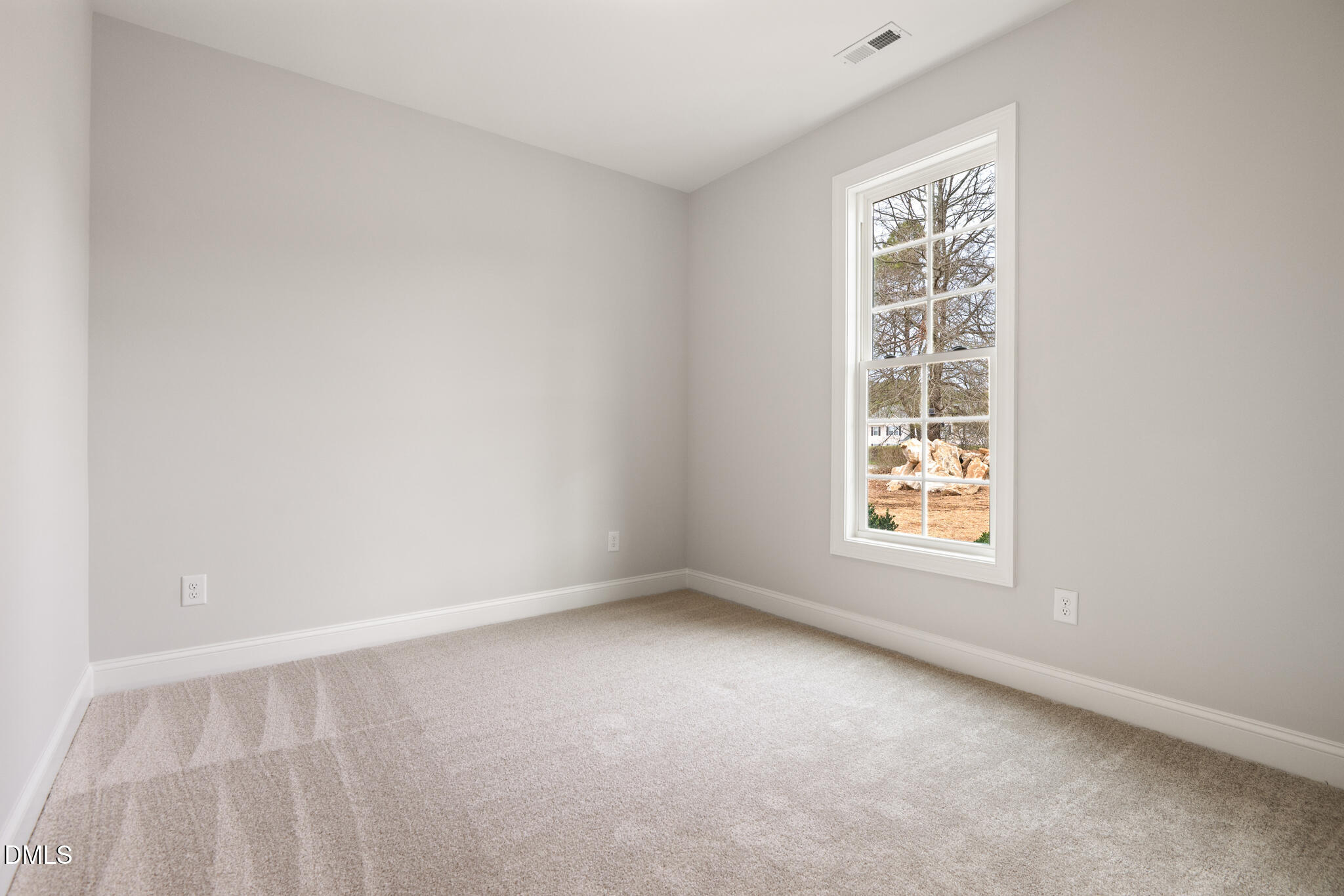 374 Vicksboro Road Henderson, NC 27536 - Photo 18 of 23 an empty room with a window