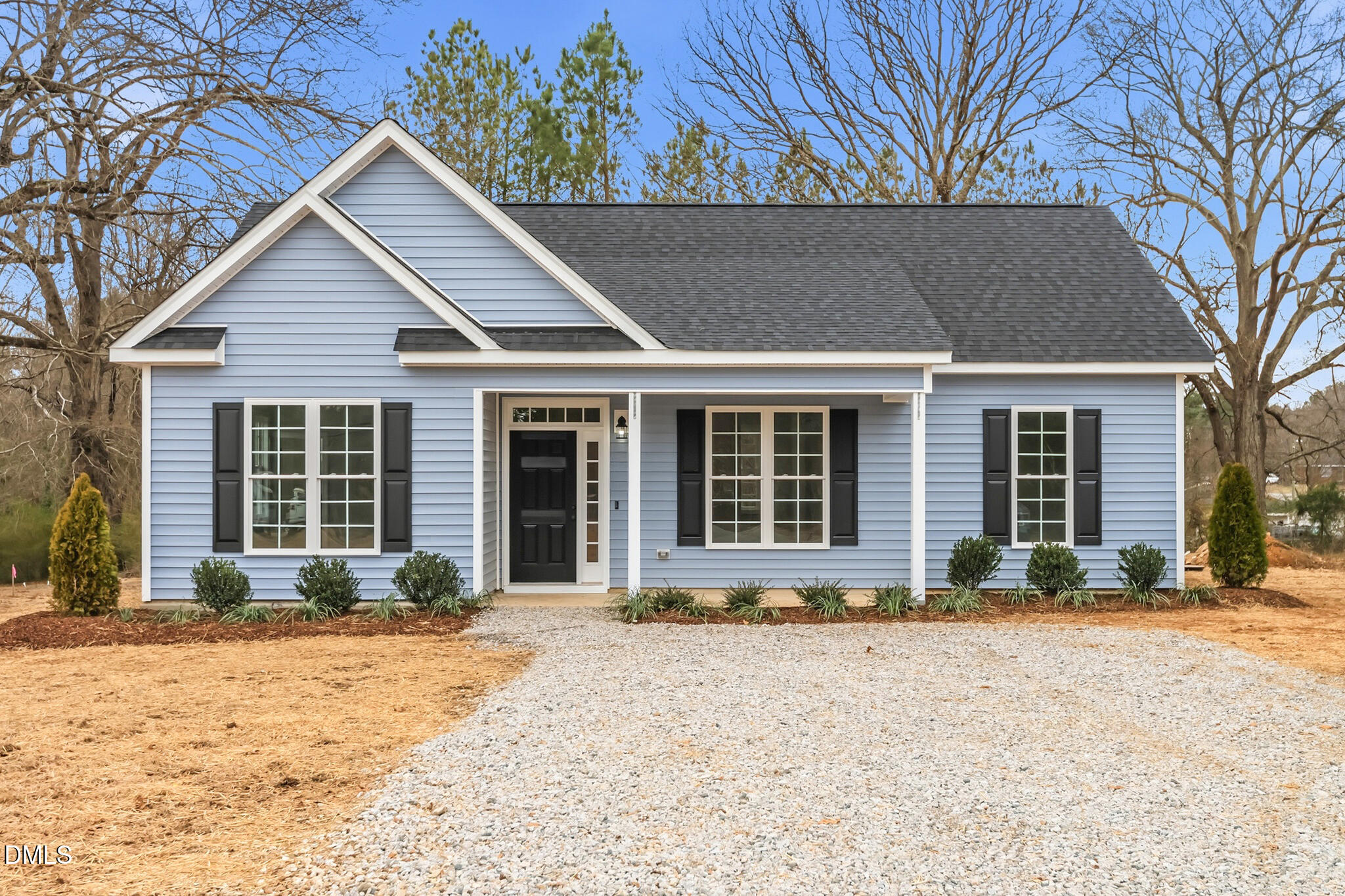 374 Vicksboro Road Henderson, NC 27536 - Photo 2 of 23 a front view of a house with a yard covered in front of it