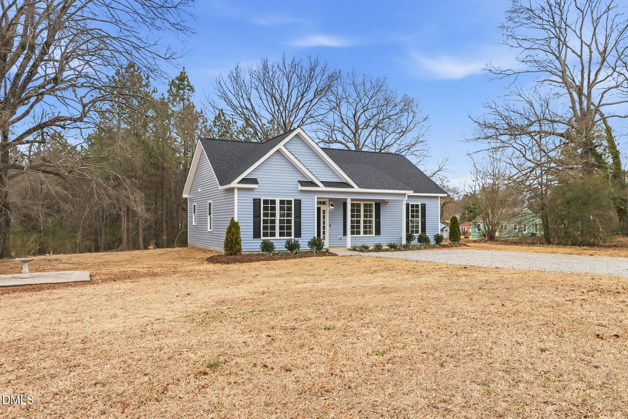 374 Vicksboro Road Henderson, NC 27536 - Photo 3 of 23 a front view of a house with a yard