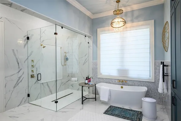 a bathroom with a sink vanity and mirror