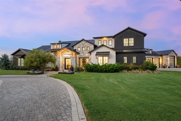 a living room with fireplace furniture and a flat screen tv