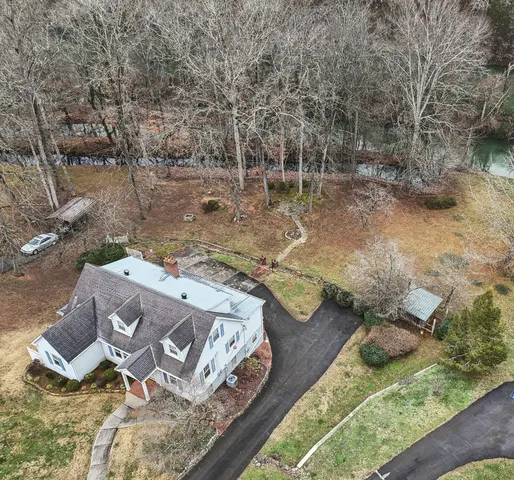 an aerial view of residential house with outdoor space