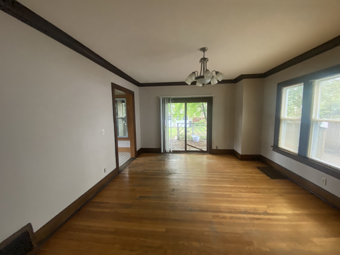 540 North 7th Street DeKalb, IL 60115 - Photo 5 of 14 a view of an empty room with a window
