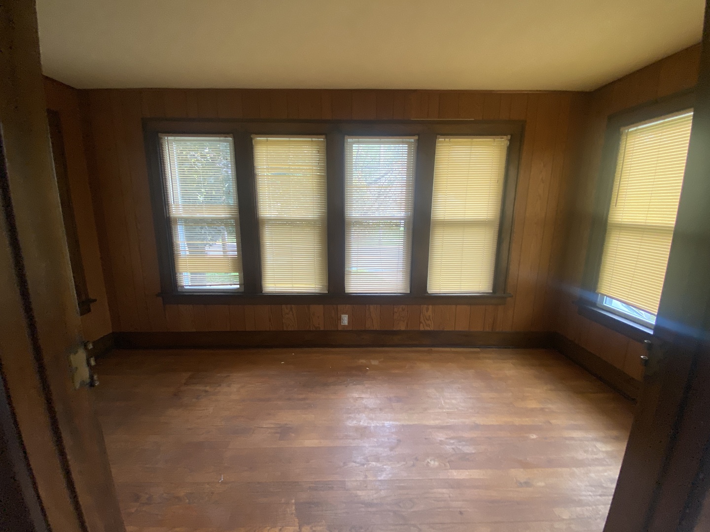 540 North 7th Street DeKalb, IL 60115 - Photo 6 of 14 a view of an empty room with a window