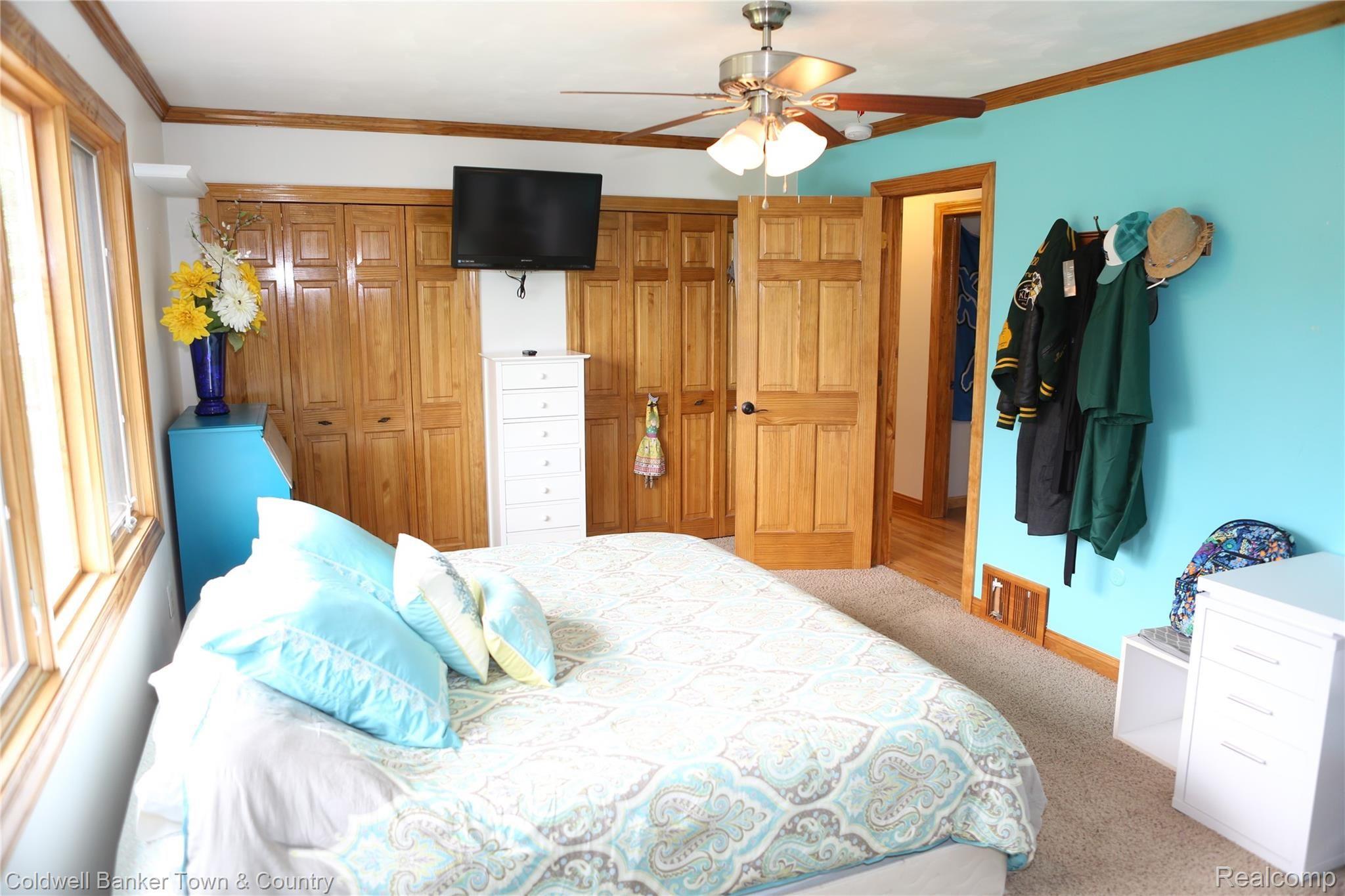 3188 West Coon Lake Road Howell, MI 48843 - Photo 45 of 65 Bedroom 2 with dual closets