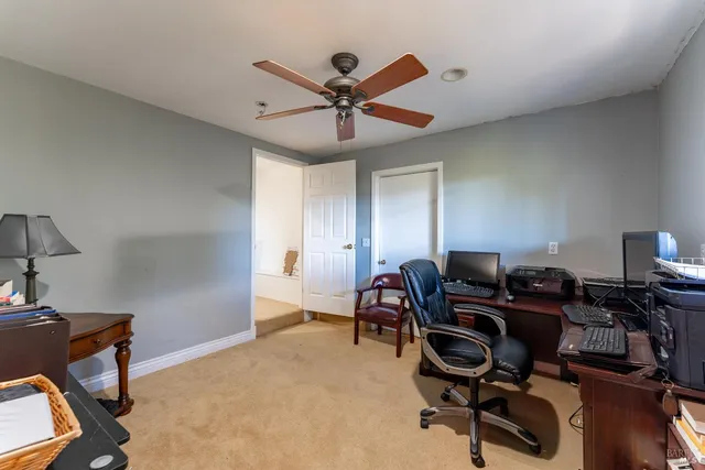 a front view of a house with yard