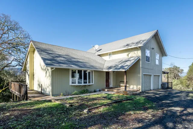 a view of a house with a large window
