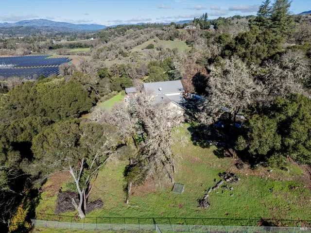 an aerial view of mountain with beach
