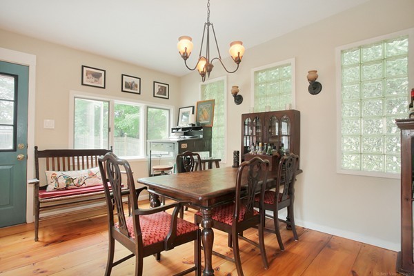 24 Red Acre Road Stow, MA 01775 - Photo 7 of 20 a view of a dining room with furniture window and wooden floor