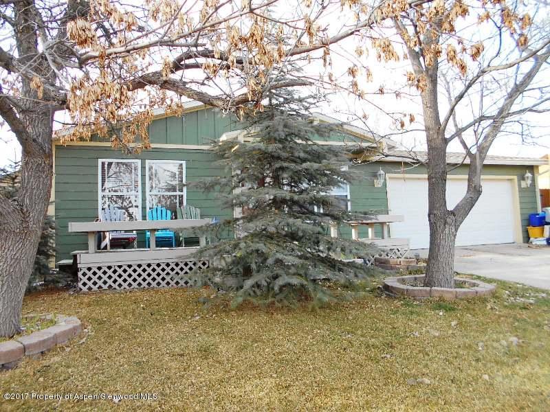 1501 Arabian Avenue Rifle, CO 81650 - Photo 4 of 23 front view of a house with a tree