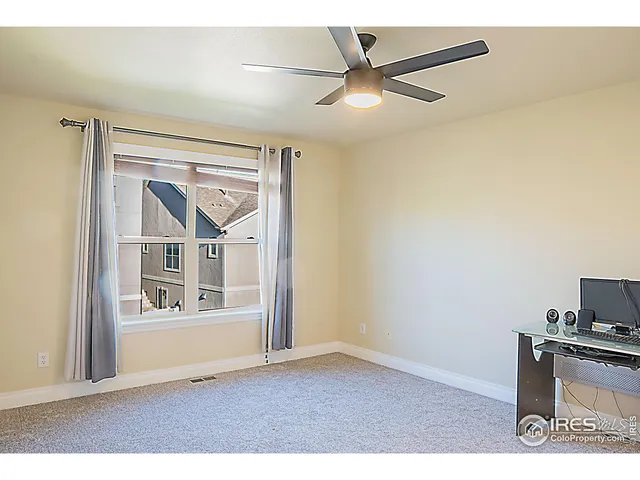 a view of livingroom with furniture window and wooden floor