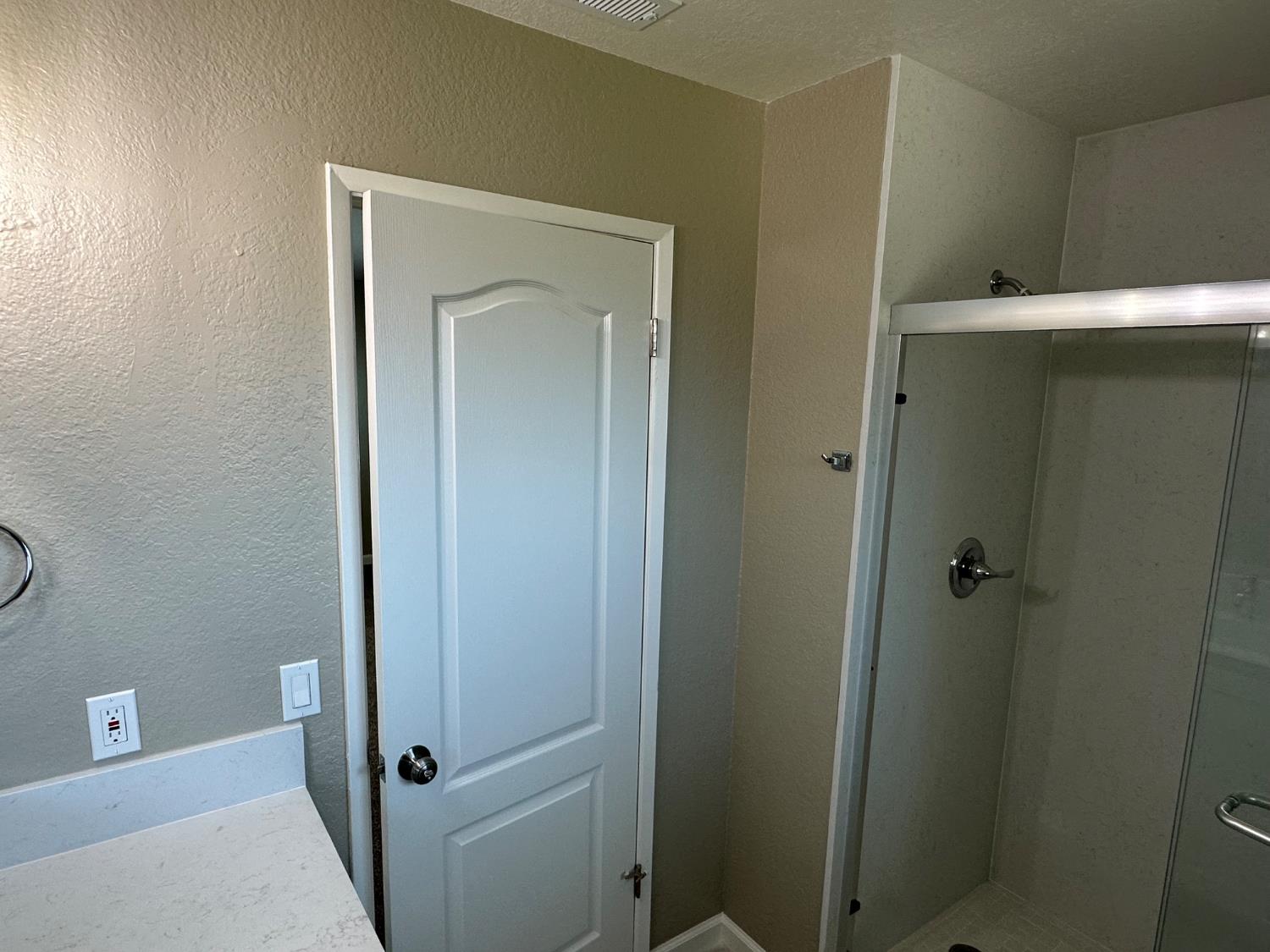 924 Kingery Drive Ripon, CA 95366 - Photo 13 of 18 a bathroom with a shower