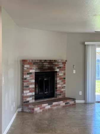 a living room with a fireplace
