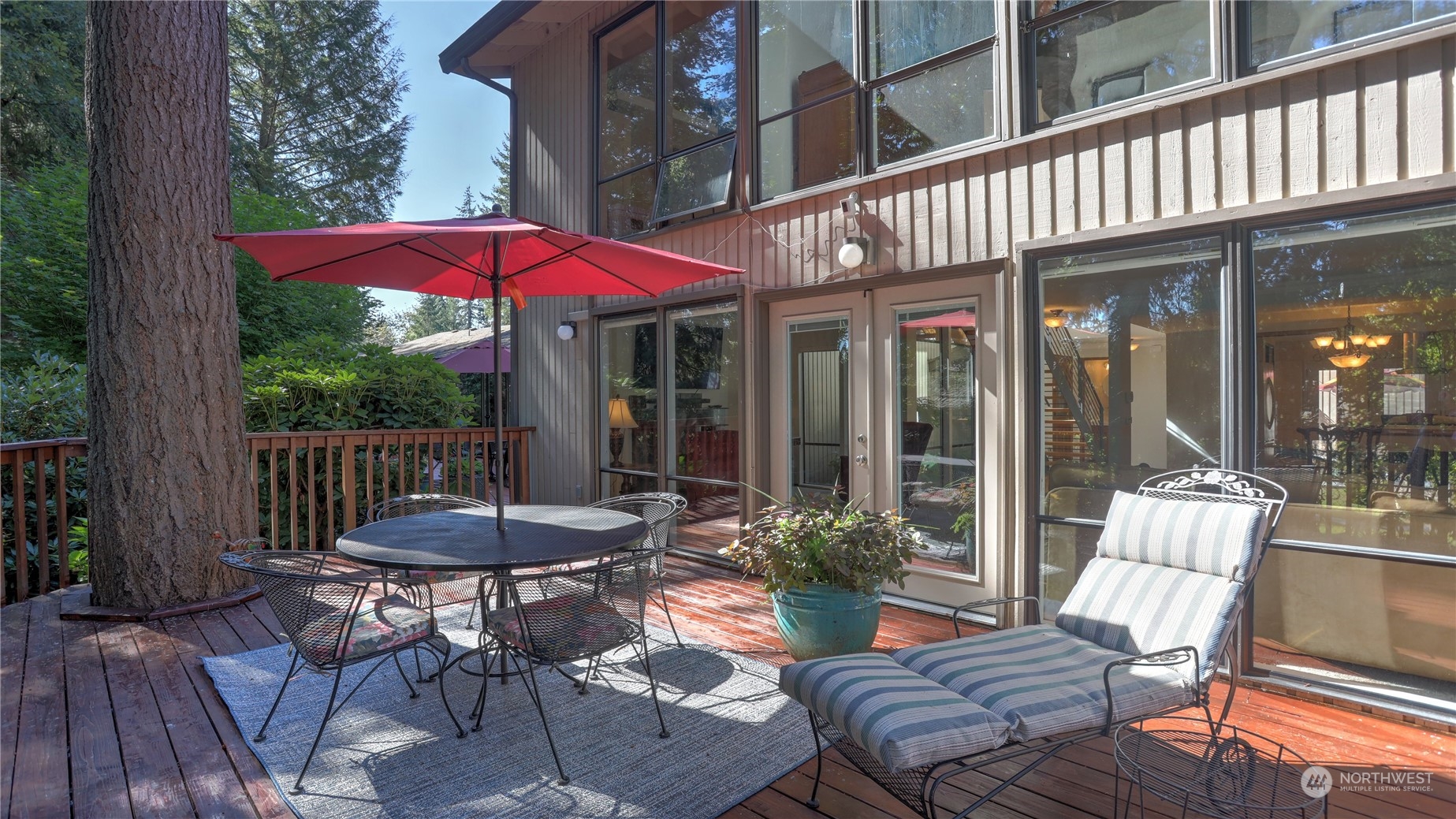 17420 147th Avenue Southeast, Unit 6 Renton, WA 98058 - Photo 19 of 32 a view of a house with a porch and furniture