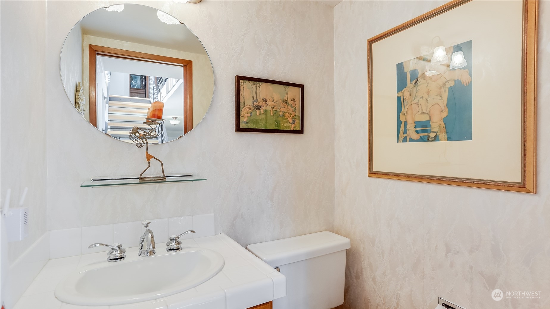 17420 147th Avenue Southeast, Unit 6 Renton, WA 98058 - Photo 20 of 32 a bathroom with a toilet a sink and mirror