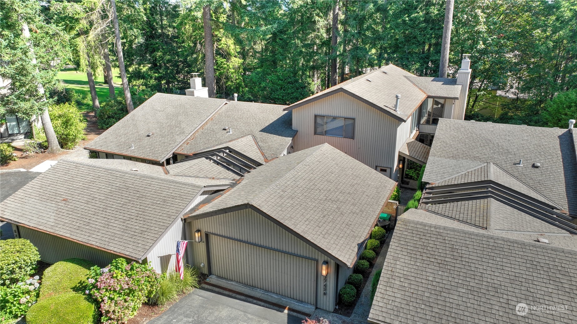 17420 147th Avenue Southeast, Unit 6 Renton, WA 98058 - Photo 2 of 32 an aerial view of a house with a yard and potted plants