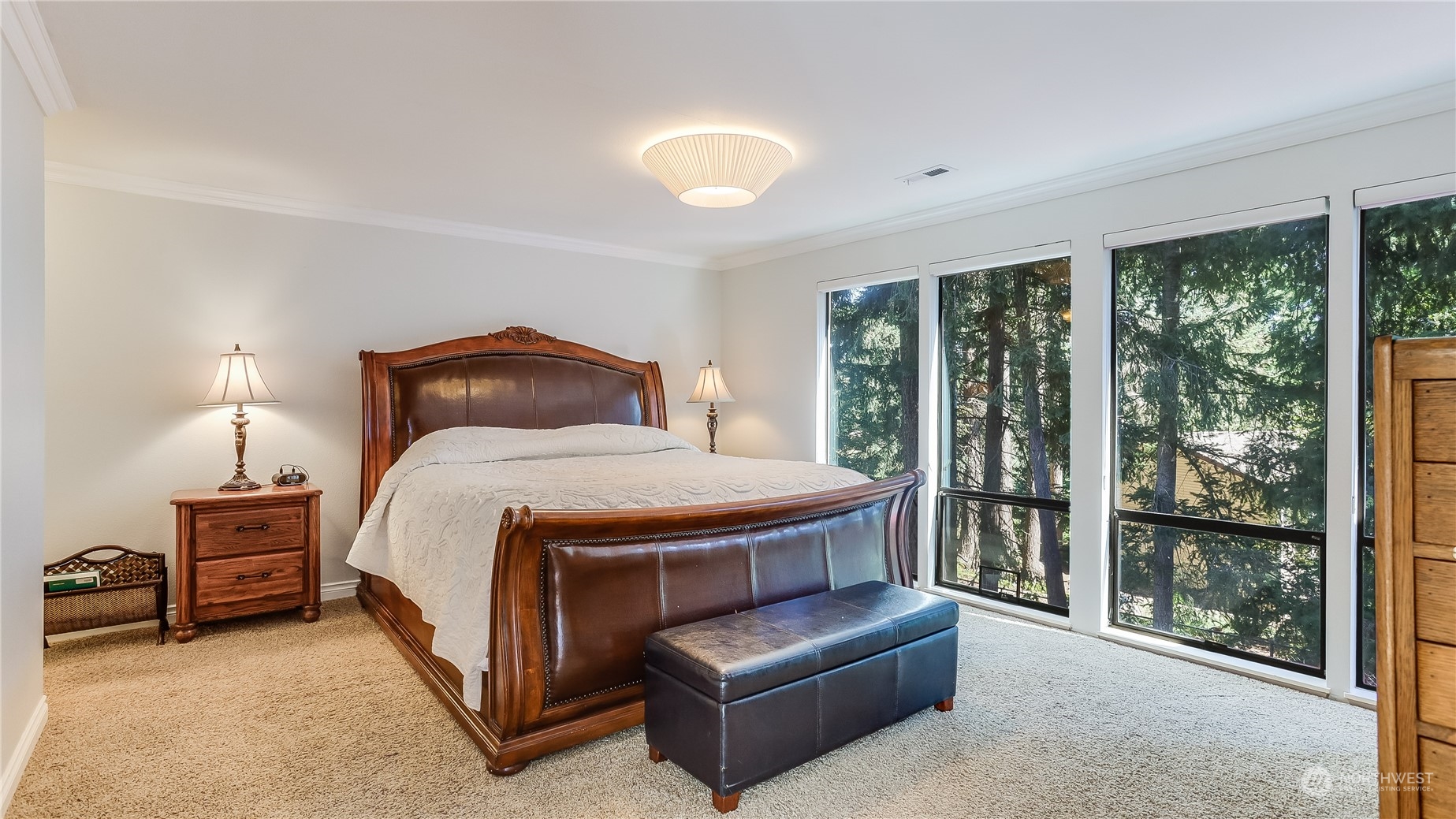 17420 147th Avenue Southeast, Unit 6 Renton, WA 98058 - Photo 21 of 32 a bedroom with a bed and a large window