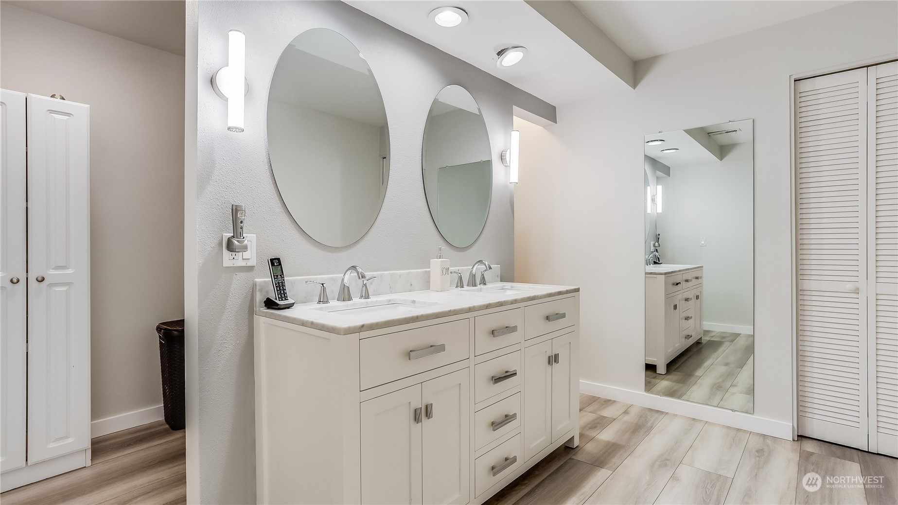 17420 147th Avenue Southeast, Unit 6 Renton, WA 98058 - Photo 23 of 32 a bathroom with a double vanity sink mirror and shower
