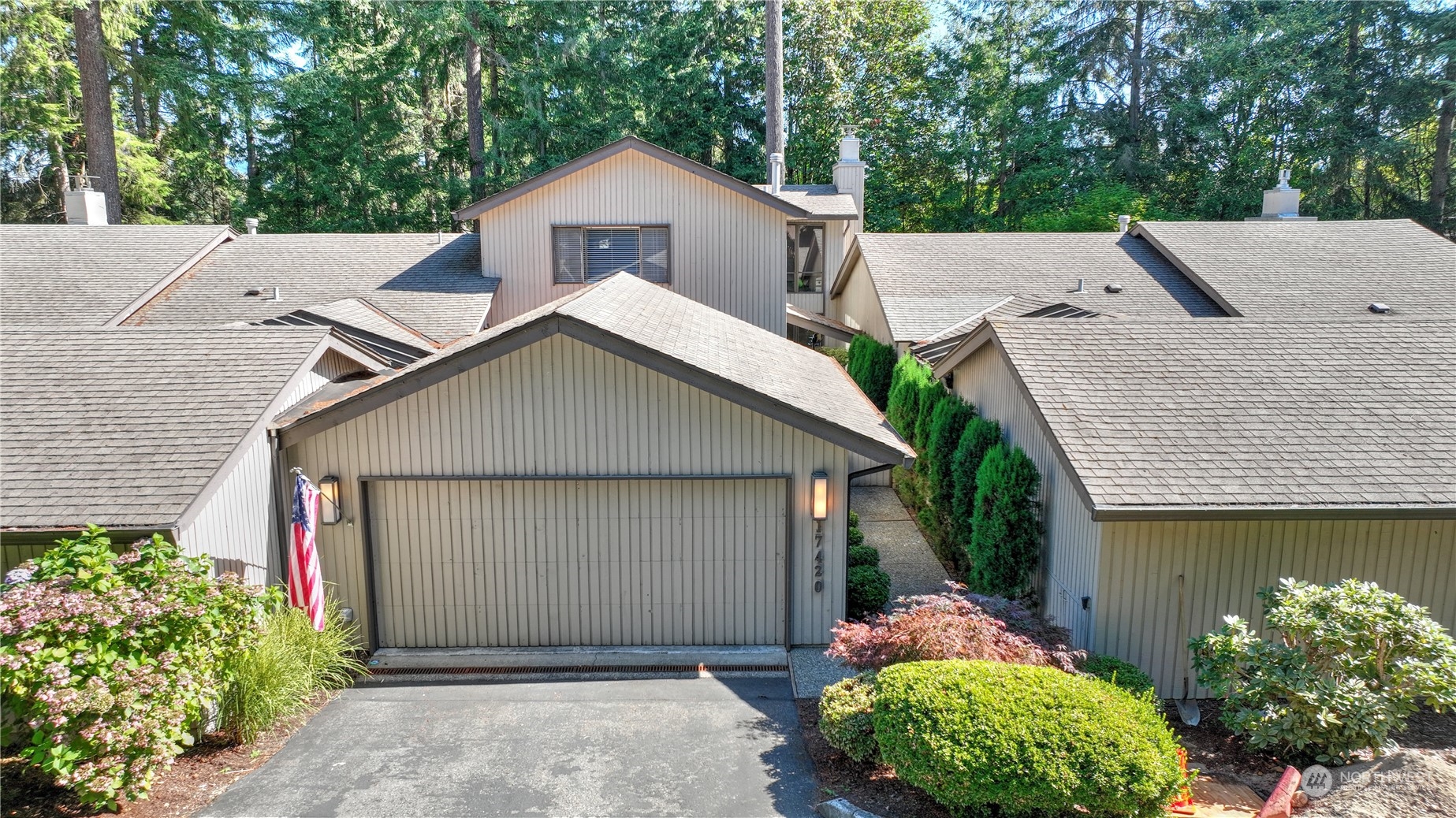 17420 147th Avenue Southeast, Unit 6 Renton, WA 98058 - Photo 32 of 32 front view of a house with a yard