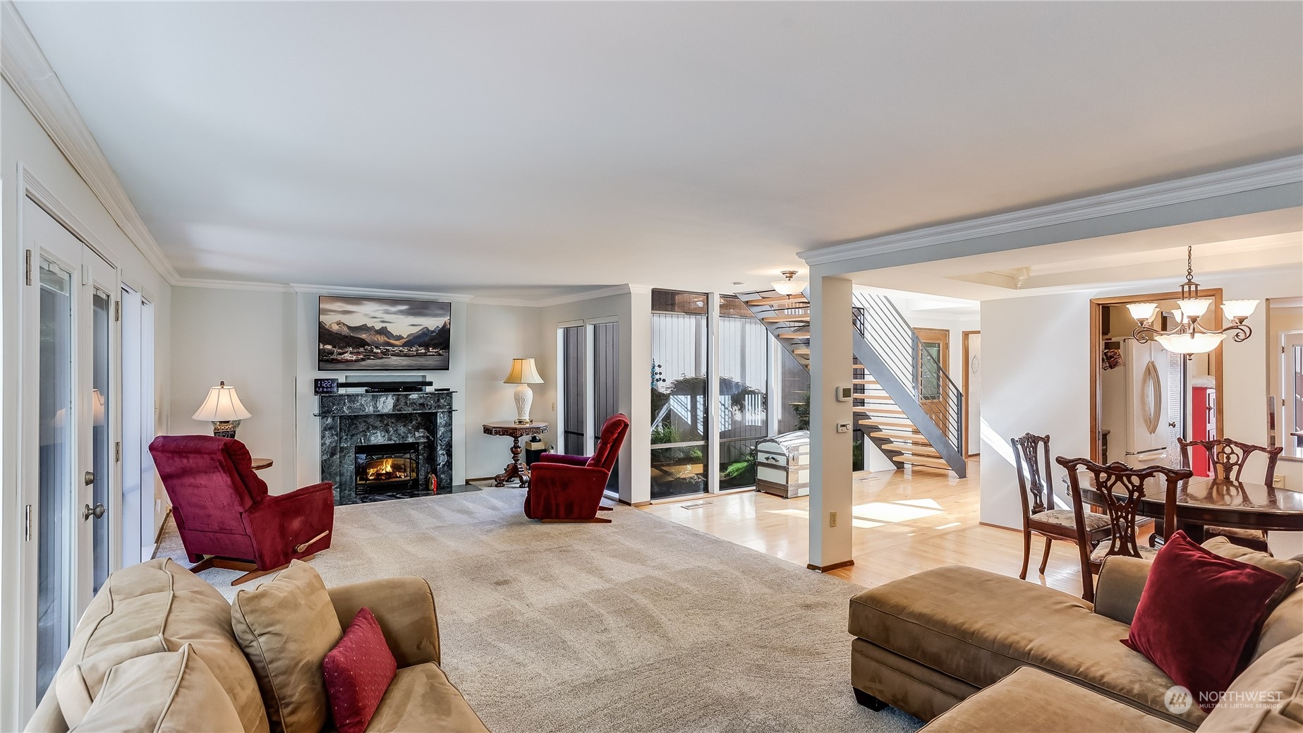17420 147th Avenue Southeast, Unit 6 Renton, WA 98058 - Photo 8 of 32 a living room with furniture a lamp and a floor to ceiling window