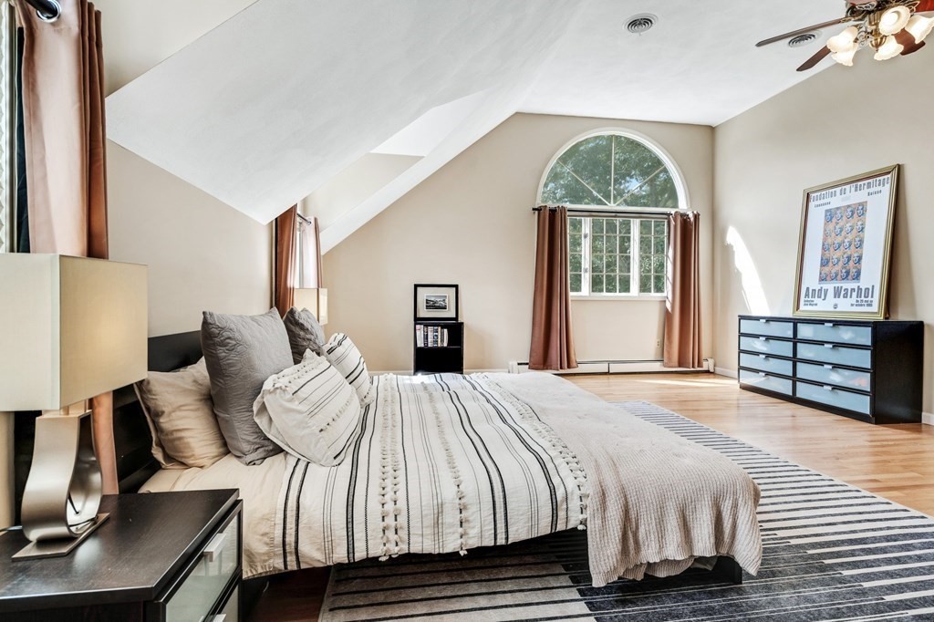 8 Liberty Road Medfield, MA 02052 - Photo 11 of 29 a bedroom with a bed and a window