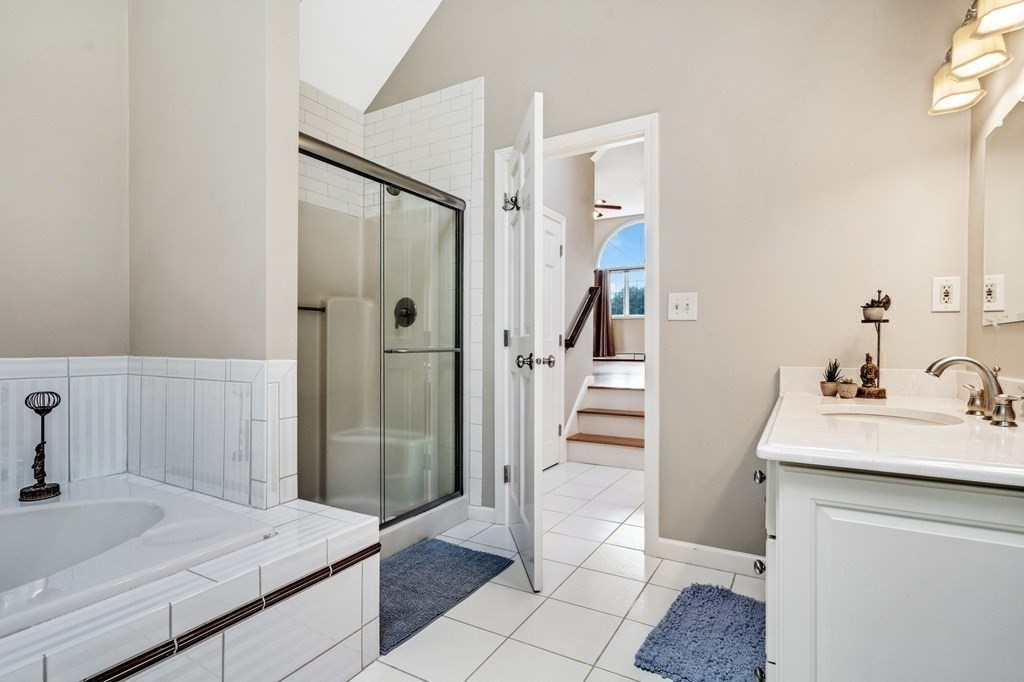 8 Liberty Road Medfield, MA 02052 - Photo 12 of 29 a bathroom with a sink and a mirror