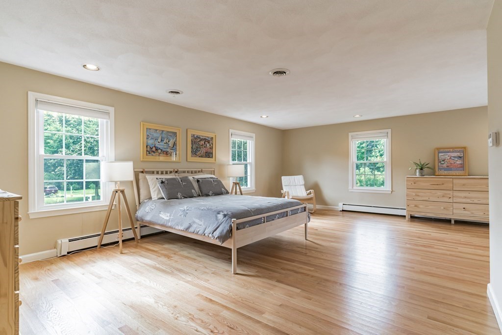 8 Liberty Road Medfield, MA 02052 - Photo 18 of 29 a living room with furniture and a window