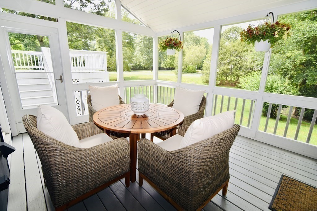 8 Liberty Road Medfield, MA 02052 - Photo 22 of 29 a view of a dining room with furniture window and outside view