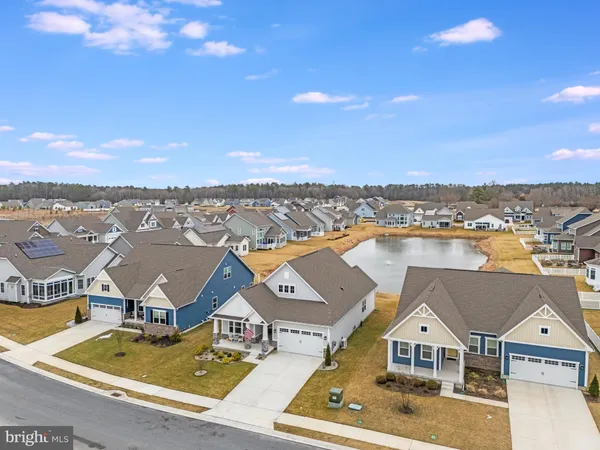 an aerial view of residential building with parking space