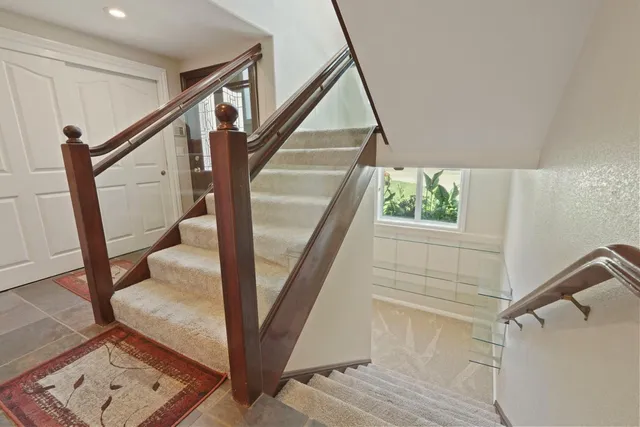 a bathroom with a sink double vanity and a mirror