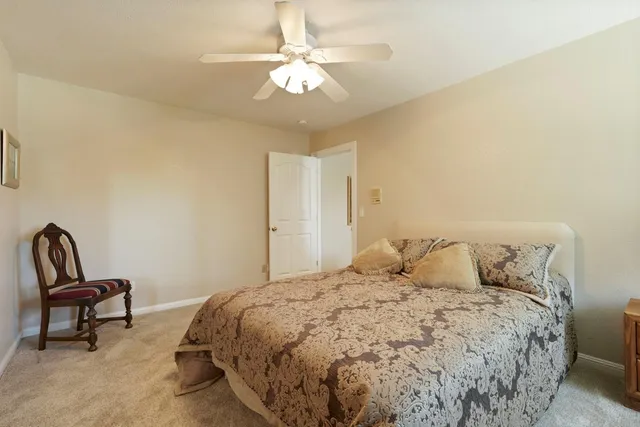 a aerial view of a house with swimming pool and garden